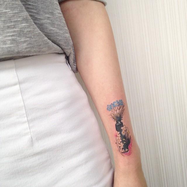 tatuaje brazo de mujer 1221