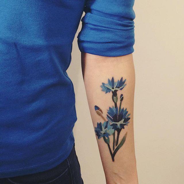 tatuaje brazo de mujer 531