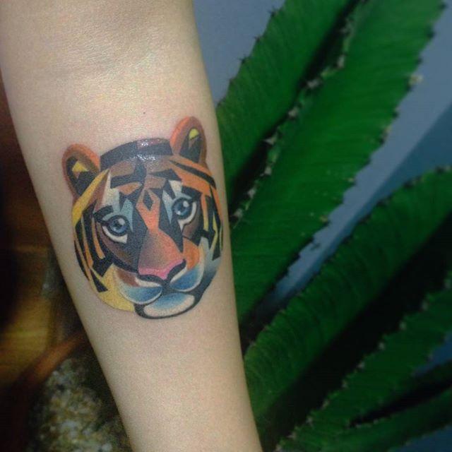 tatuaje tigre 311
