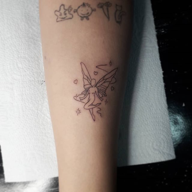 tattoo femenino con una hada 04
