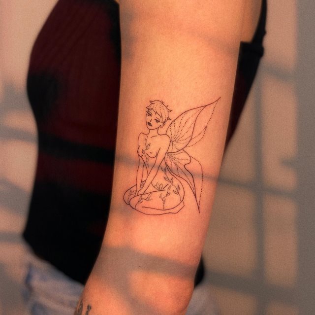 tattoo femenino con una hada 09