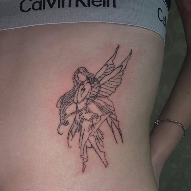 tattoo femenino con una hada 18