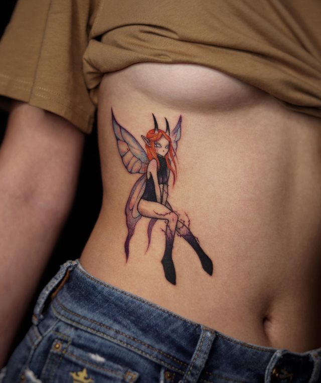 tattoo femenino con una hada 31