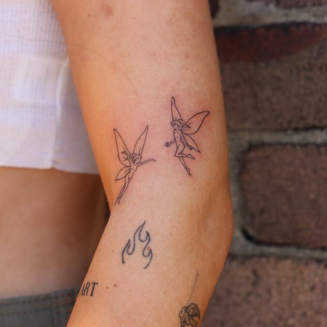 tattoo femenino con una hada 43