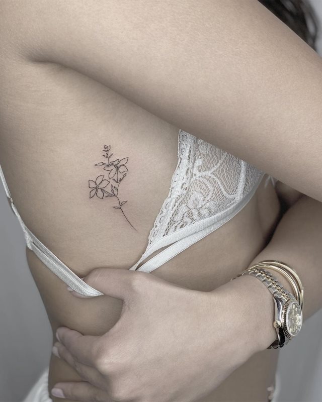 tattoo femenino flor 54