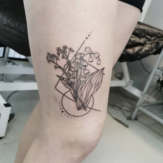 tattoo femenino flor en la pierna 08