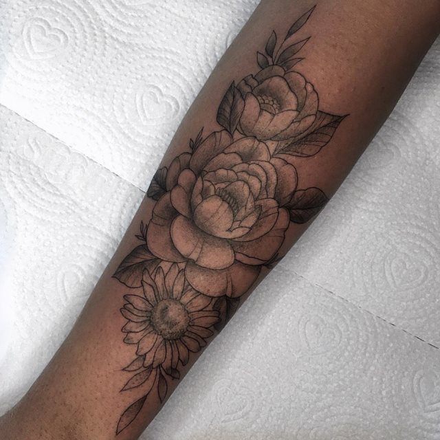 tattoo femenino flor para el brazo 39