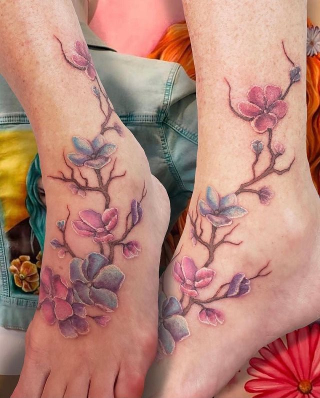 tattoo femenino flor para el pie 42