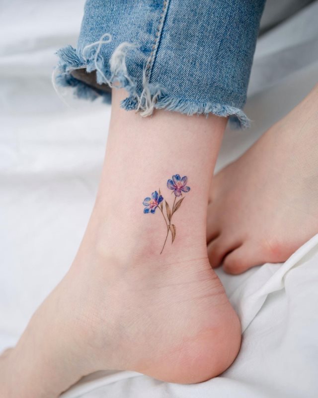 tattoo femenino flor pequena 04