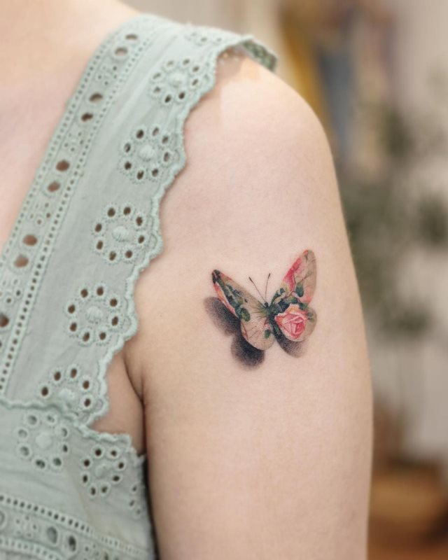 tattoo femenino flor pequena 23