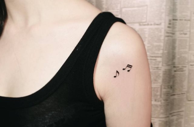 tattoo femenino musical 22