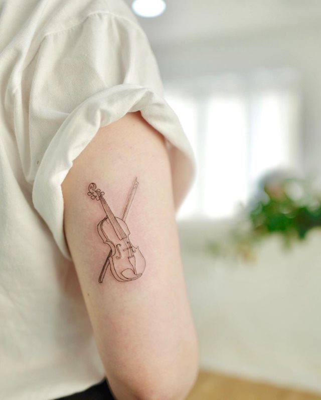 tattoo femenino musical 33