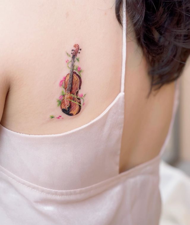 tattoo femenino musical 34