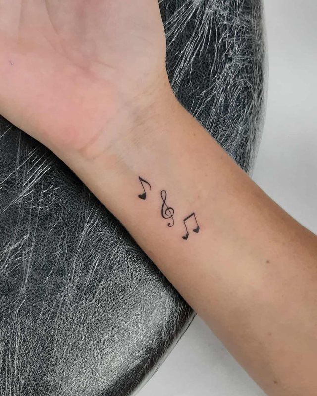 tattoo femenino musical 54